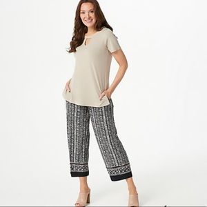 Susan Graver Regular Liquid Knit Top &
Printed Crop Pants Set, size XL.